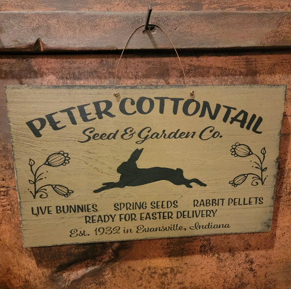 #WHLPC-PW "Peter Cottontail Seed & Garden" Hanging Wood Sign-Pearwood 9X15 Inch