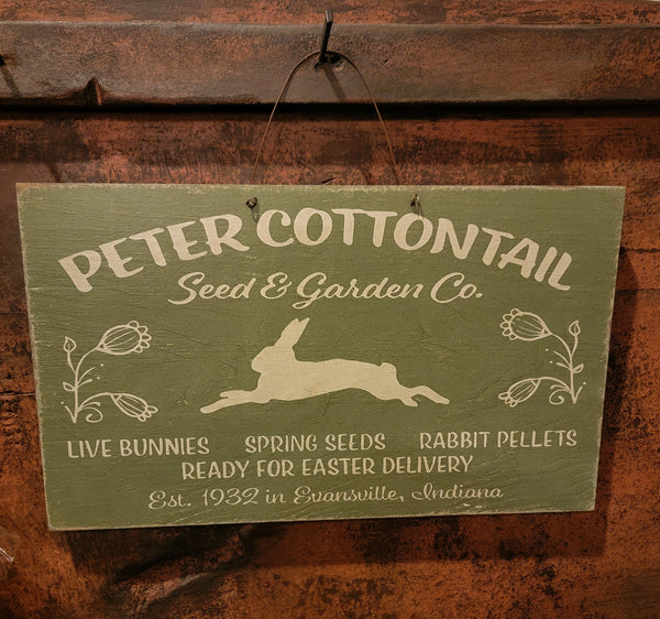 #WHLPC-GR  "Peter Cottontail Seed & Garden" Hanging Wood Sign-Sage Green 9X15 Inch